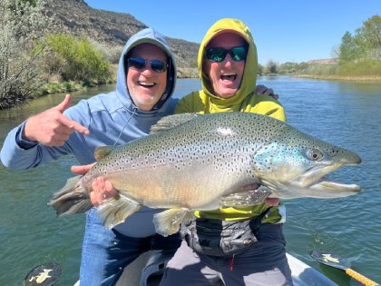 fisheads-guide-with-large-brown-trout-420px