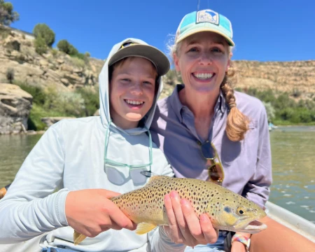 mother-son-with-brown-trout