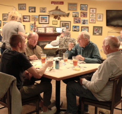 Guests eat dinner main room Colored